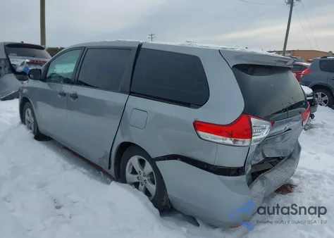 2011 Toyota Sienna Base V6 z USA, uszkodzony, nr VIN 5TDZK3DC0BS016190